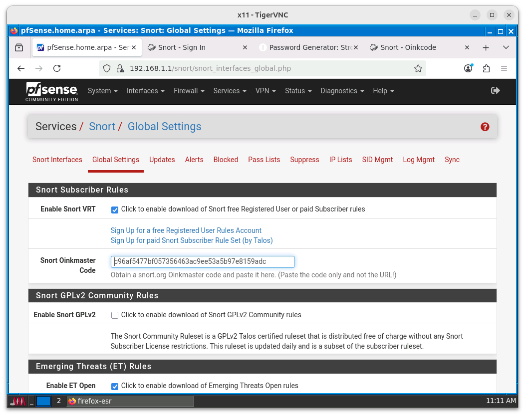 Configuración de la descarga de reglas de *Snort VRT* y *ET Open*.